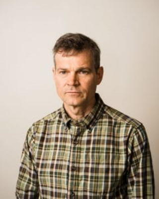 Headshot of Chris Stokes